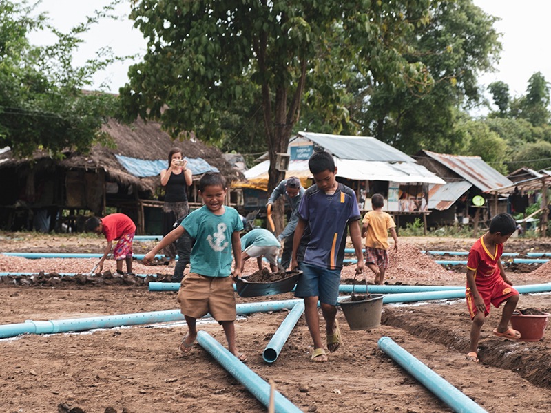 The children in the community are very excited about a new field.